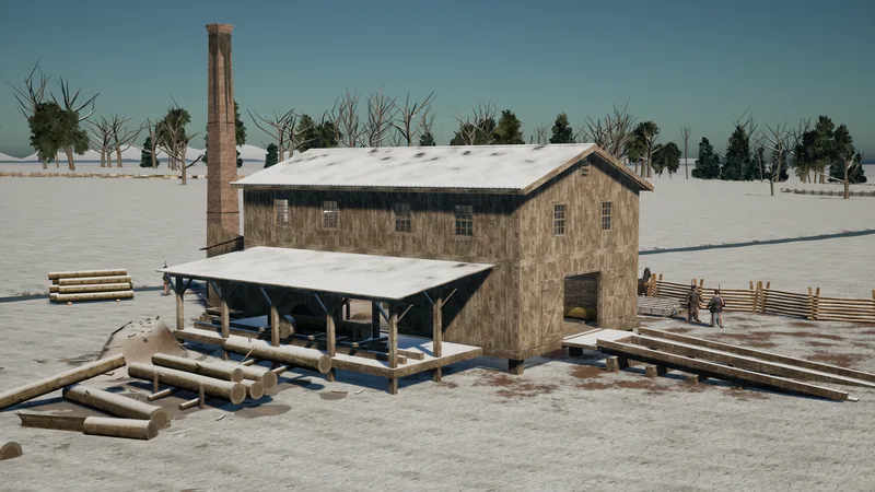 High view of a weathered board sawmill with an open-sided saw shed, a brick chimney, logs and timber skids in the snow, bare trees and pines behind.